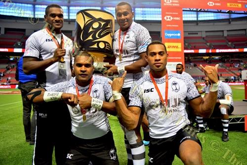 Debutant Batinisavu Uluiyata, front right, with teammates Vasikali Mudu, Josua Vakurinabili and Paula Dranisinukula with the Canada 7s trophy. Picture: JOVESA NAISUA