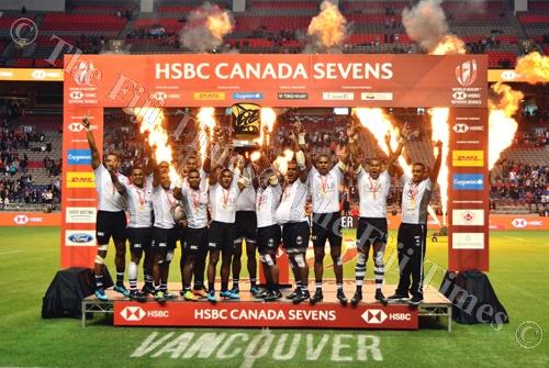 The Fiji 7s team celebrate their win after defeating Kenya 31-12 in the cup final of the Vancouver 7s in Canada yesterday. Picture: JOVESA NAISUA