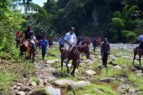 Prime Minister Voreqe Bainimarama on horseback during his tour of Noemalo District in the upper reaches of the Wainimala River two years ago. Picture: File