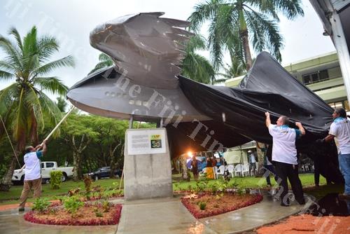 The staff of the University of the South Pacific unveiling the RNZAF Commemorative Monument at the University on Friday evening. Picture: JOVESA NAISUA