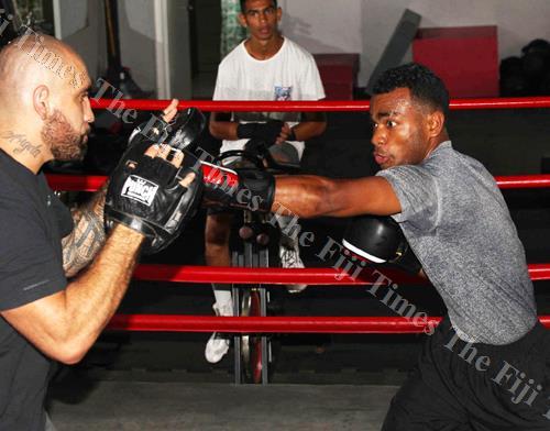 Boxer Jone Koroilagilagi Davule during a training session with his coach Napoleon Taumoepeau in Suva. Picture: JONA KONATACI