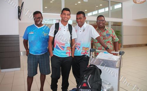 Lautoka players Zibraz Sahib and Kavaia Rawaqa return with the Vodafone Fiji soccer team from the Philippines and greeted by Lautoka soccer manager Paul Abraham (right) and a fan. Picture: FIJI FA MEDIA