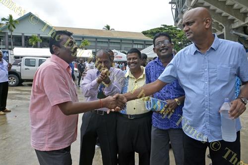 Minister for Local Government Parveen Kumar (Left) greets Then India Valiva (TIV) Sangam National President Tarunesh Reddy (right) as Then India Sanmarga ikya (TISI) Sangam General Manager Karna Waddi Raju (2nd from left), TISI National President Sadasiva