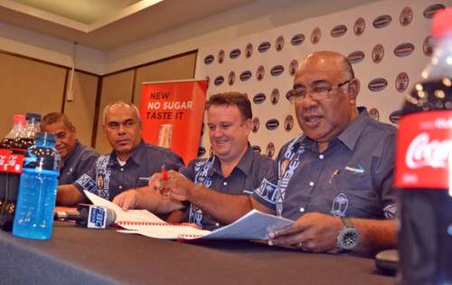 Coca-Cola Amatil Fiji general manager Roger Hare, third from left, and Fij Secondary School Rugby Union president Setareki Merekula (with glasses) during a press conference at the Holiday Inn in Suva today. Picture: JONACANI LALAKOBAU