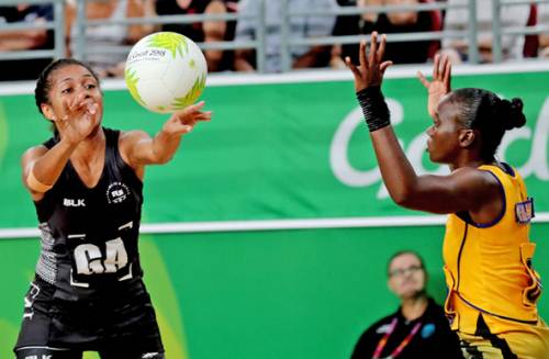 Maliana Rusivakula tussles with her Barbados counterpart during the Commonwealth Games netball competition. Picture: ELIKI NUKUTABU