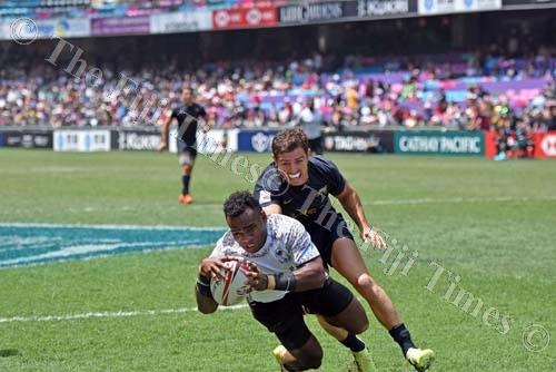 Fiji Airways Fiji 7s team captain Jerry Tuwai dives over to score a try against Argentina during the quarter-final at Hong Kong. Fiji won 40-14. Picture: RAMA