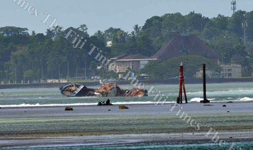 The Lurongyuanyu fishing vessel stuck and sunk along the Suva passage yesterday.Picture ATU RASEA
