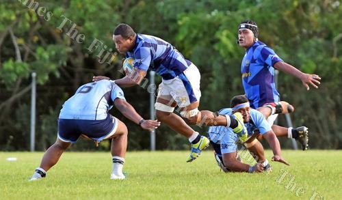 Jitoko Usamaki of Navy on attack against QVSOB during the Escott Shield challenge at Bidesi Ground yesterday. Picture: RAMA
