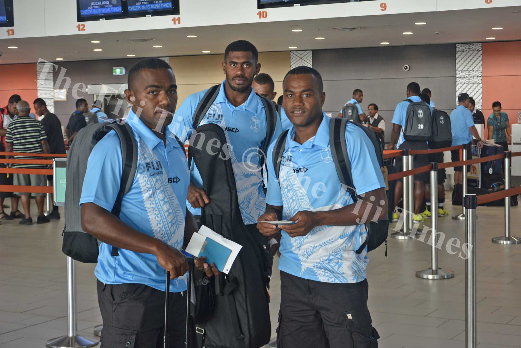 Fiji Airways Men’s 7s players Waisea Nacuqu (left), Kalione Nasoko and Alosio Naduva at Nadi International Airport yesterday. Picture: REINAL CHAND