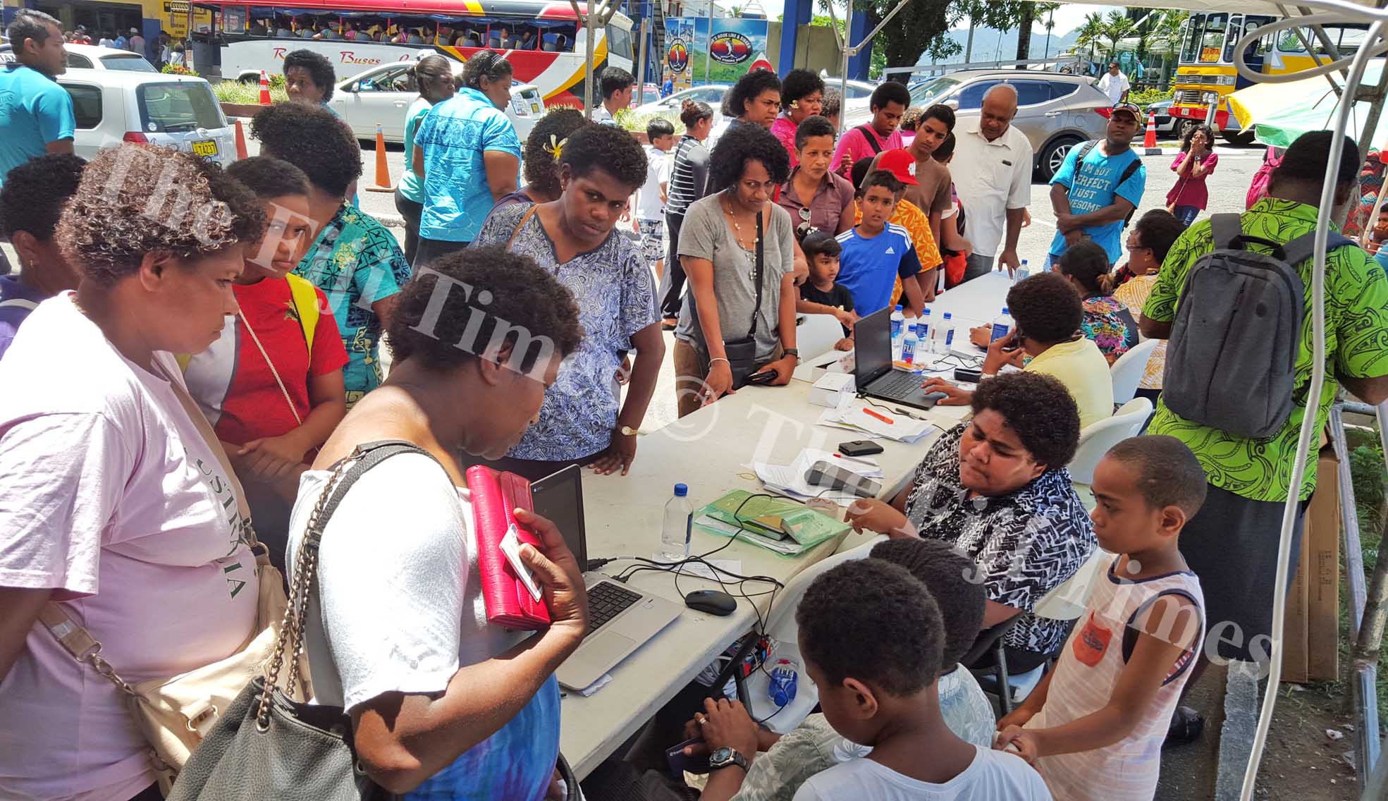 People queue up to register for students e-ticketing cards in Suva. Picture: ELIKI NUKUTABU