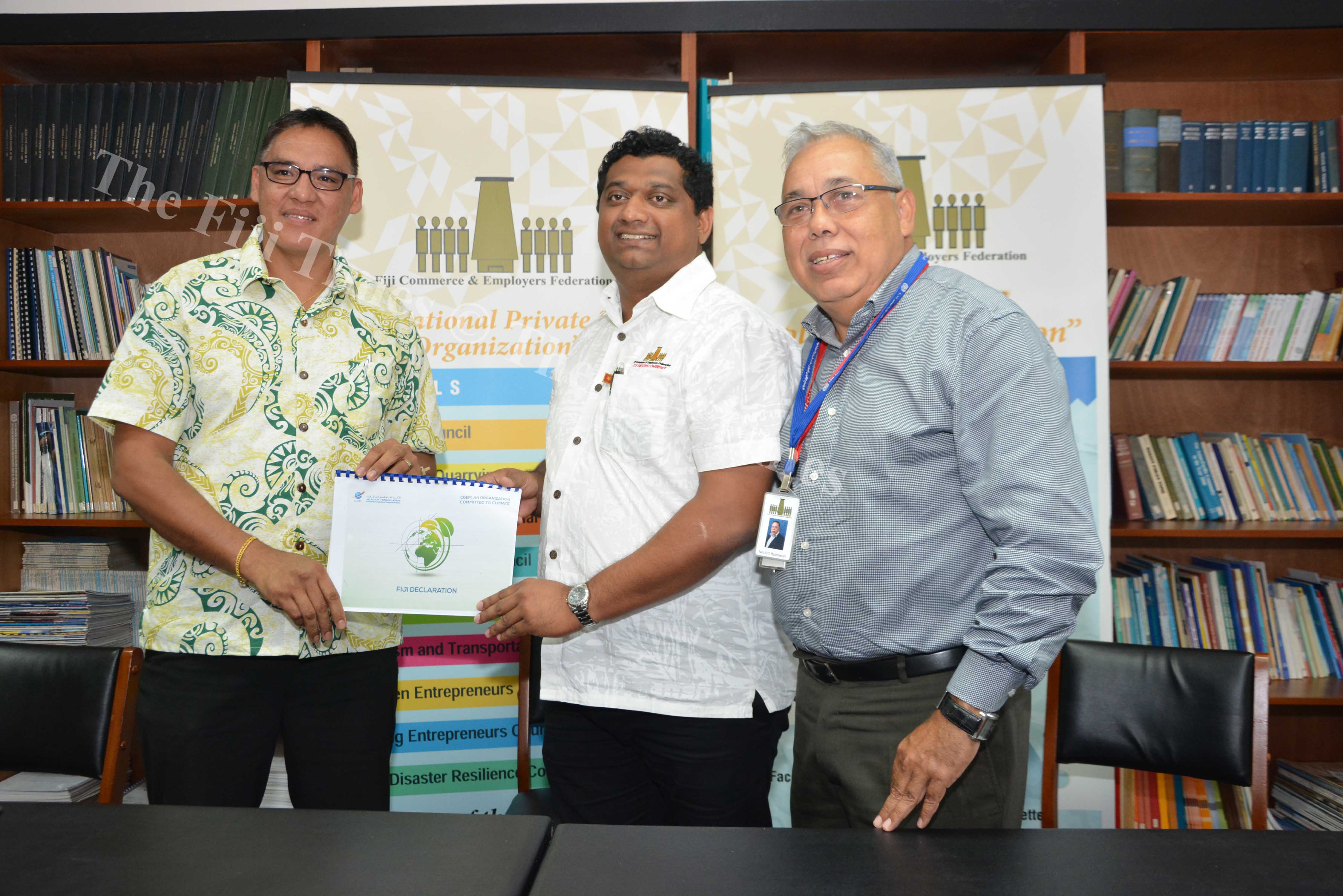Fiji Commerce & Employers Federation CEO  Nesbitt Hazelman (right) with the Immediate Past President Himen Chandra (centre) and Fiji Business Disaster Risilience Council Vice Chair Leonard Chan during the official handover of the presidency of the MBA4 Climate (Marakech Business Action for Climate) Declaration. Picture: JOVESA NAISUA