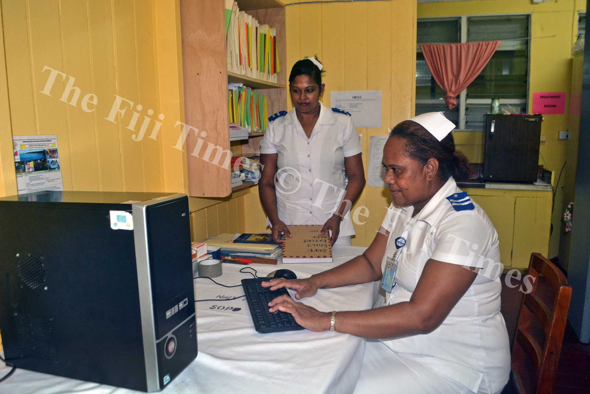 Nurses Losana Disoni (right) and Yamla Reddy work in the newly opened Special Out-Patients Department at the Nadi Hospital yesterday. Picture: REINAL CHAND