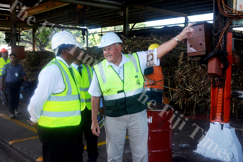 Fiji Sugar Corporation CEO Graham Clark (right) explains improvements made to the Lautoka mill to Waterways Minister Dr Mahendra Reddy yesterday. Picture REINAL CHAND