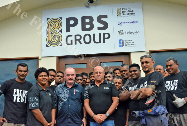 Simon Ahearn, PBS Group General Manager standing front left with Michael Fairfax, Managing Director PBS Group with Workshop staff at their Headquarters in Lami, Suva. Picture: SUPPLIED