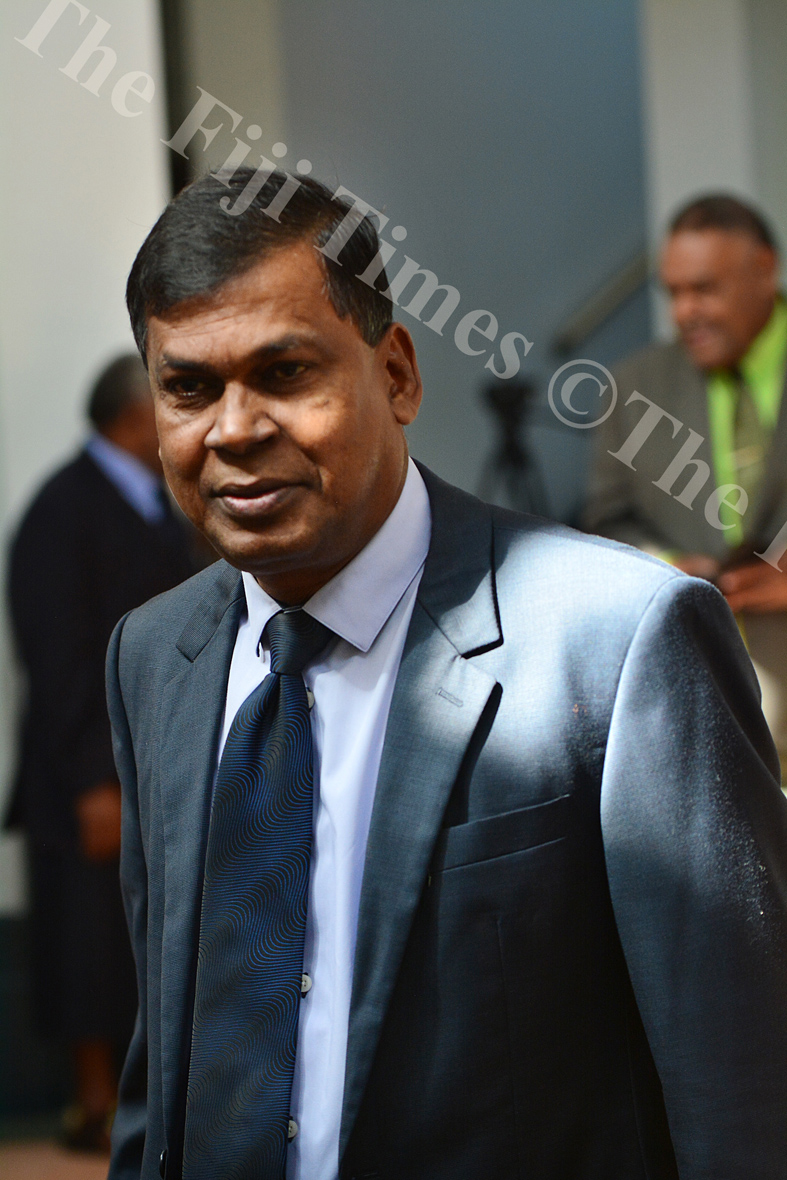 Opposition MP Biman Prasad arriving at the parliament complex in Suva. Picture: JOVESA NAISUA