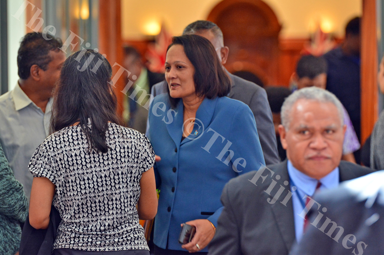 Minister for Health and Medical Services Rosy Akbar in full discussion during break between session at Parliament on Wednesday, July 11, 2018. Picture: JOVESA NAISUA