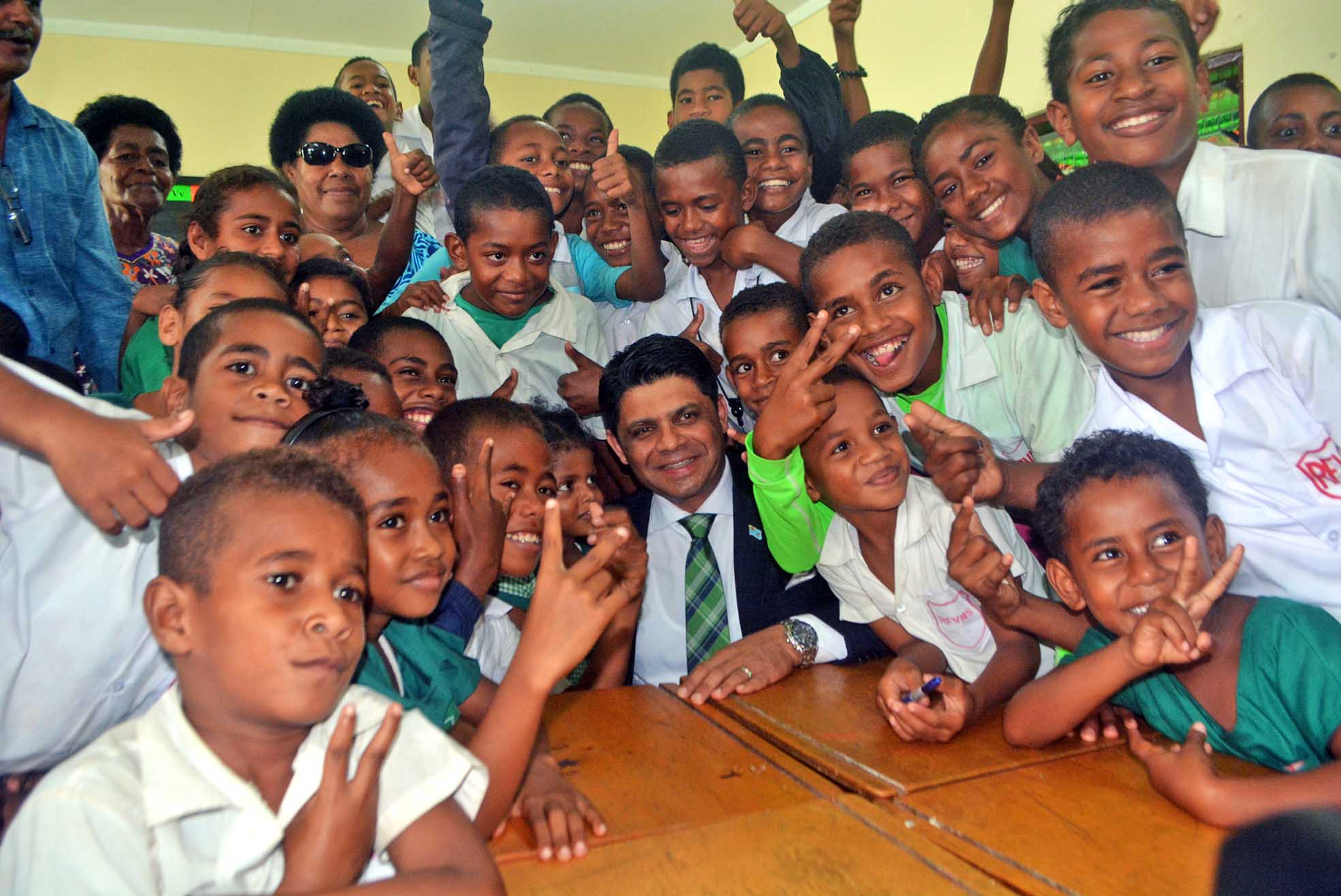 Attorney General and Minister for Education Aiyaz Sayed Khaiyum with Ratu Filimoni Vukinamualevu Memorial School students after the commissioning of the New Classrooms block in Ba yesterday. Picture: REINAL CHAND