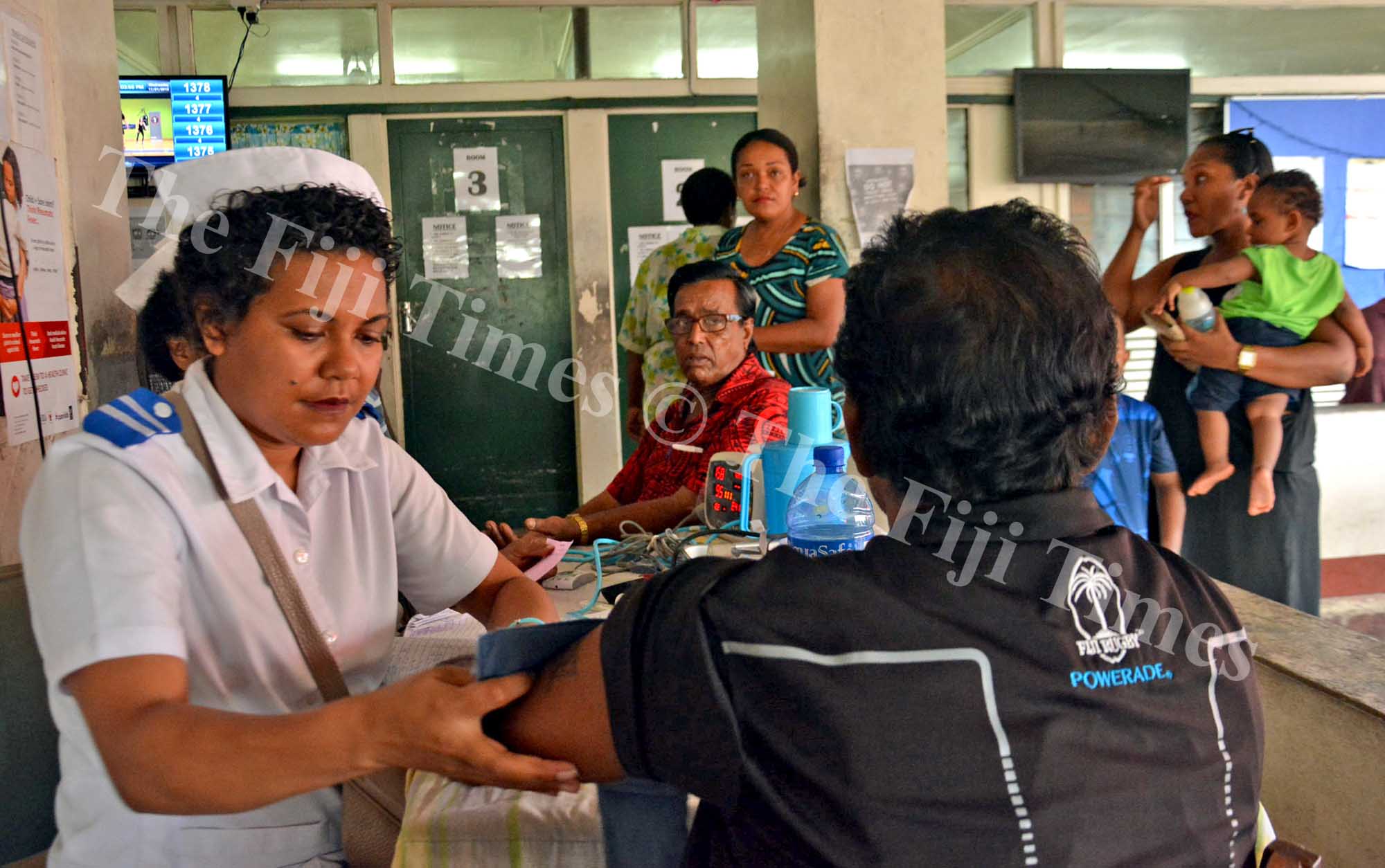 Staff nurse Lanieta Talolo, left, attends to patients at the Valelevu Health Centre in Nasinu on Wednesday, January 17, 2018. Picture: JONACANI LALAKOBAU