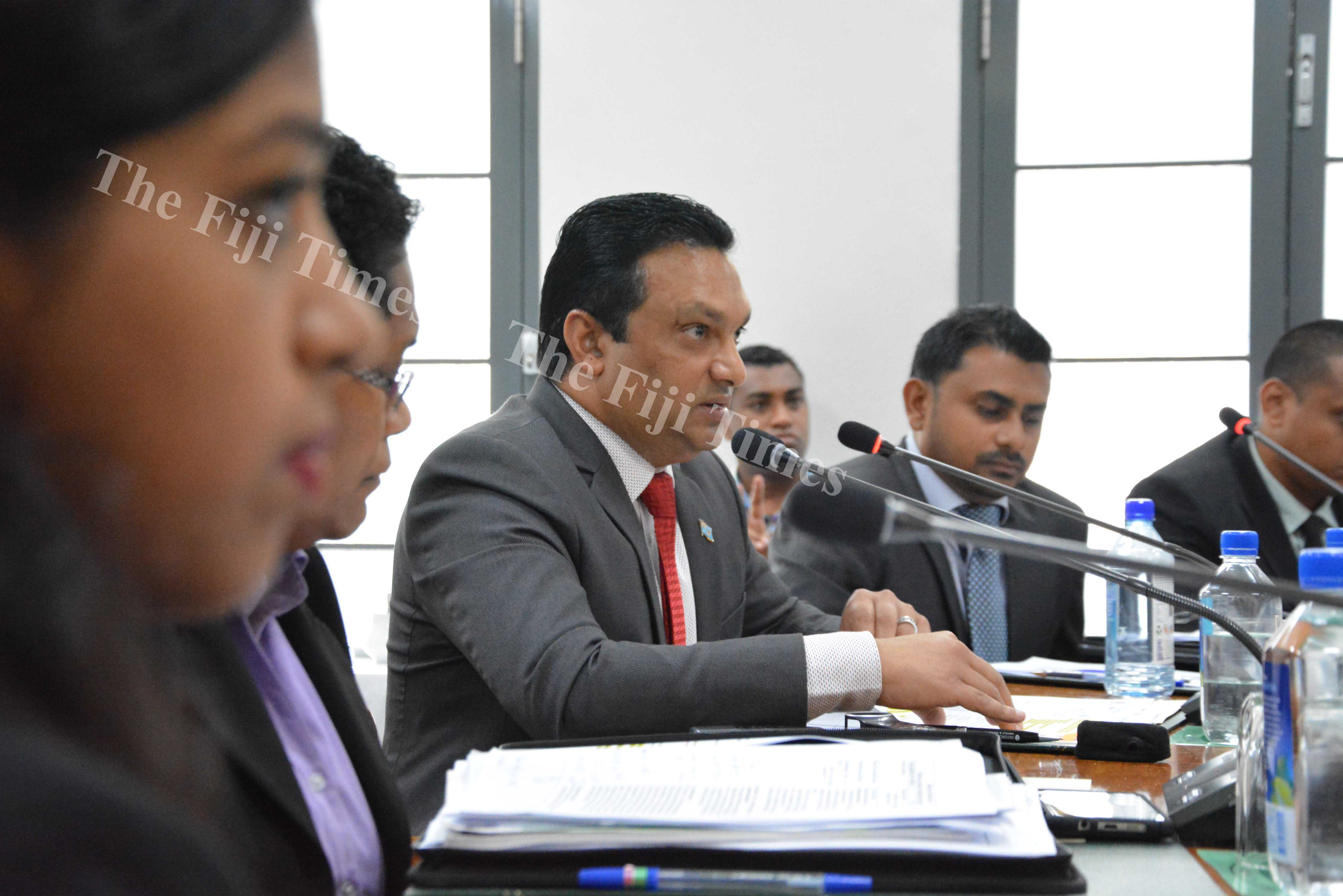 Permanent Secretary for the Ministry of Public Enterprises Jitendra Singh (centre) delivers his presentation during the Standing Committee on Public Accounts at the Parliament Complex in Suva yesterday. Picture: JOVESA NAISUA