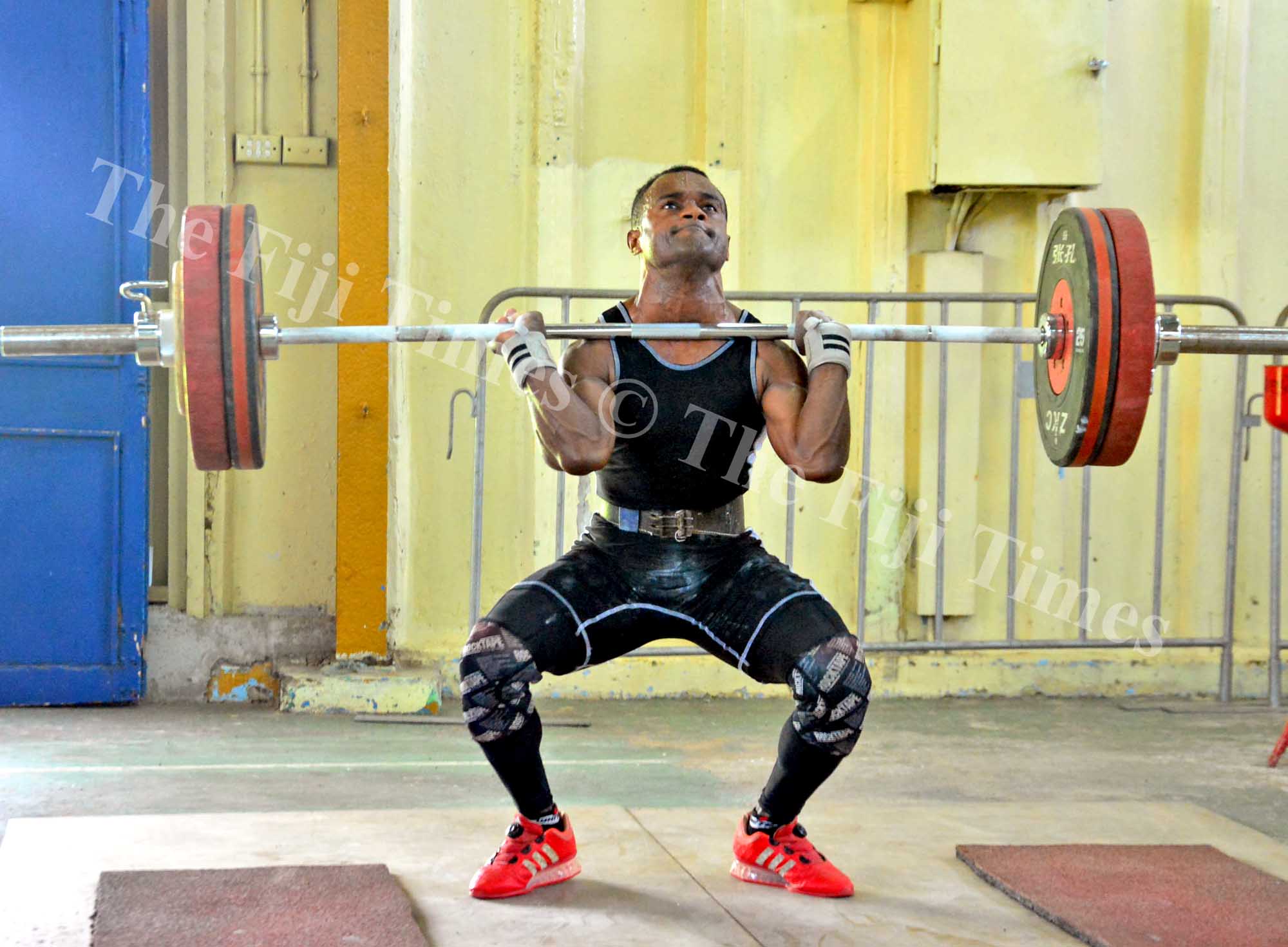 Manueli Tulo in action during the weightlifting competition at the National Fitness Centre in Laucala Bay, Suva on Saturday, January 20, 2018. Picture: JONACANI LALAKOBAU