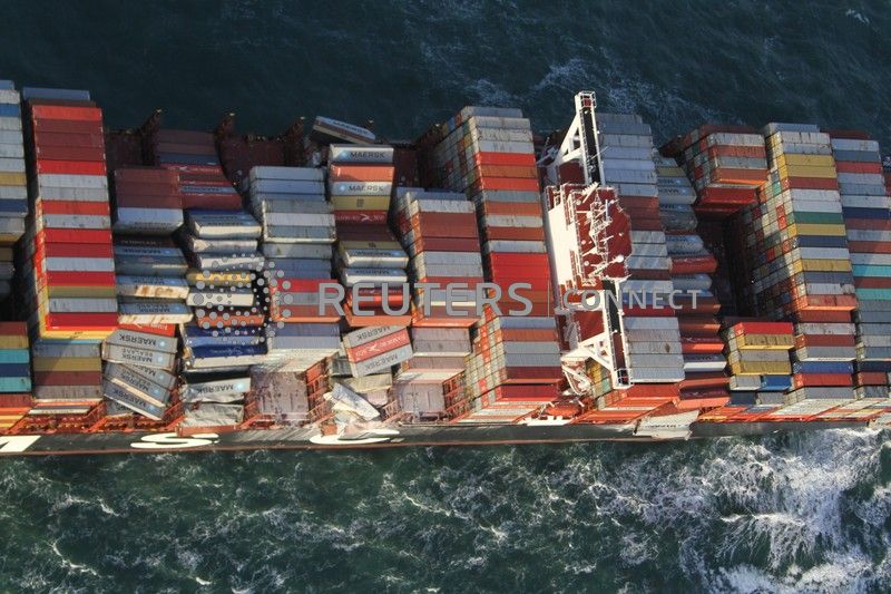 Container Freighter Spill Swiss shipping line starts clean up of Dutch waters after container ...