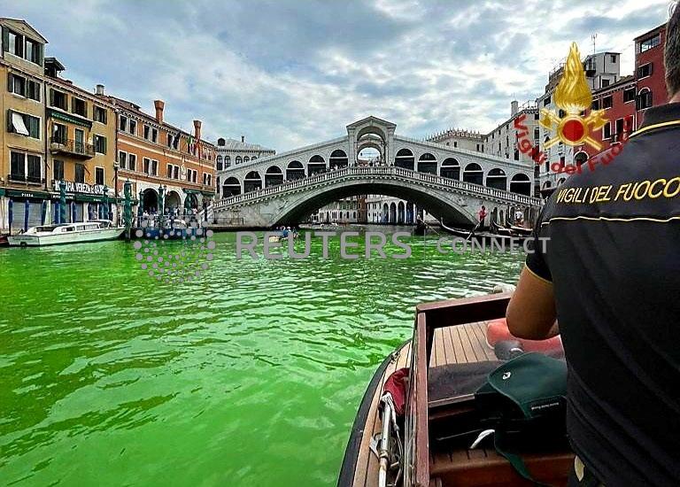 The Fiji Times » Venice’s waters turn fluorescent green near Rialto Bridge