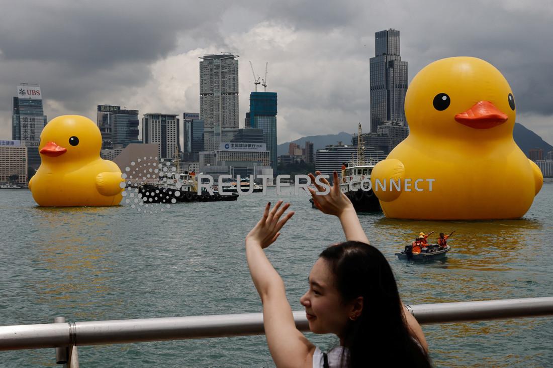 Two giant rubber ducks debut in Hong Kong in bid to drive