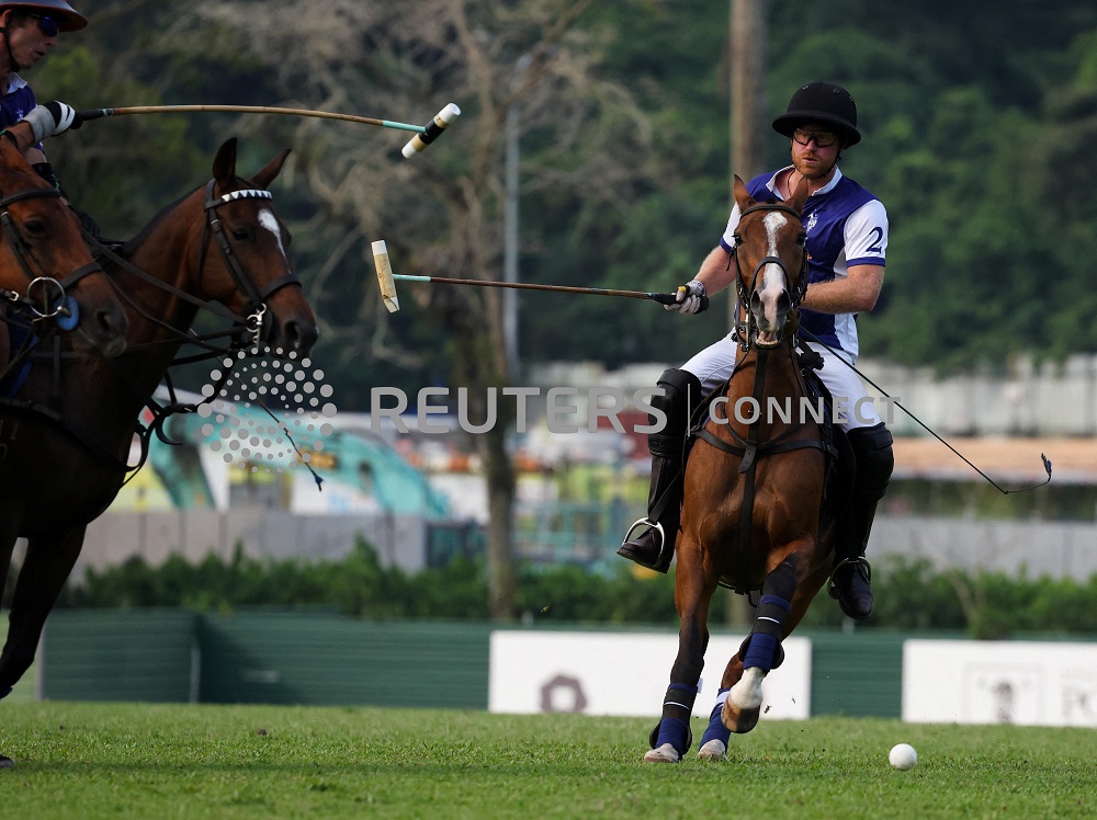 Britain's Prince Harry saddles up for Singapore charity polo game The