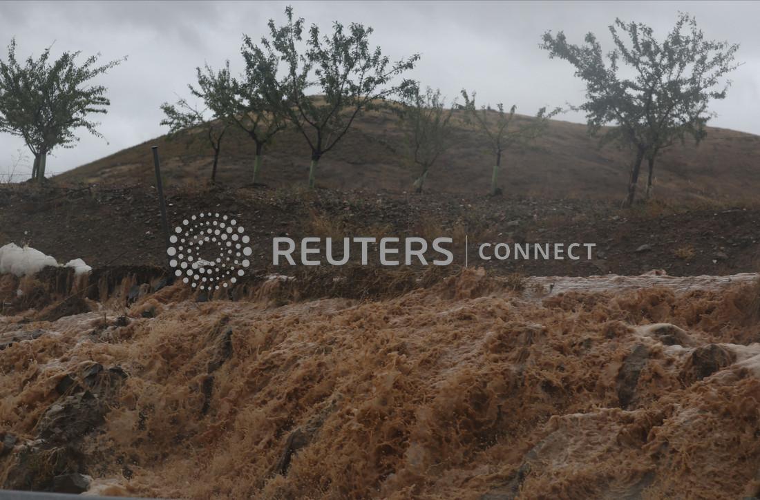 Madrid residents told to stay at home as torrential rain sweeps across Spain
