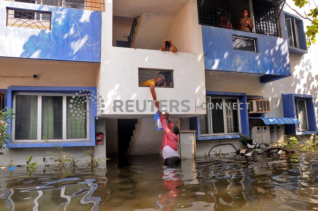 Hundreds still stranded, plants closed in India's floodhit Chennai