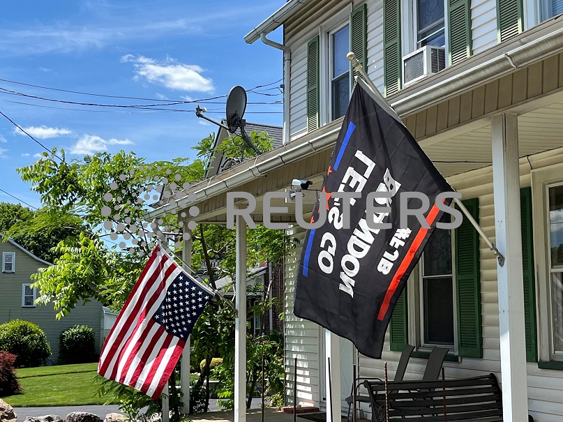 Trump supporters turn US flags upside down to protest guilty verdict