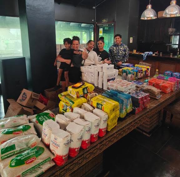 Katy Pakinga with the team from the South Pacific Foundation, ready to deliver food rations to victims of the flood in Nadi last week. Picture: JOSEFA SIGAVOLAVOLA.