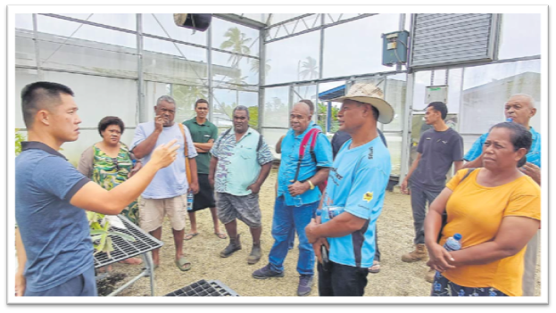 Taiwan Technical Mission expert Pascal Kuo shares information with a group of farmers at their nursery in Nausori yesterday. Picture: TIMOCI VULA