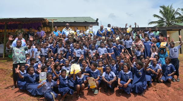 Students of Ro Camaisala Memorial School with Deputy Prime Minister and Minister for Trade Manoa Kamikamica after the official handover ceremony at Nabukavesi, Namosi, yesterday. Picture: JOSEFA SIGAVOLAVOLA