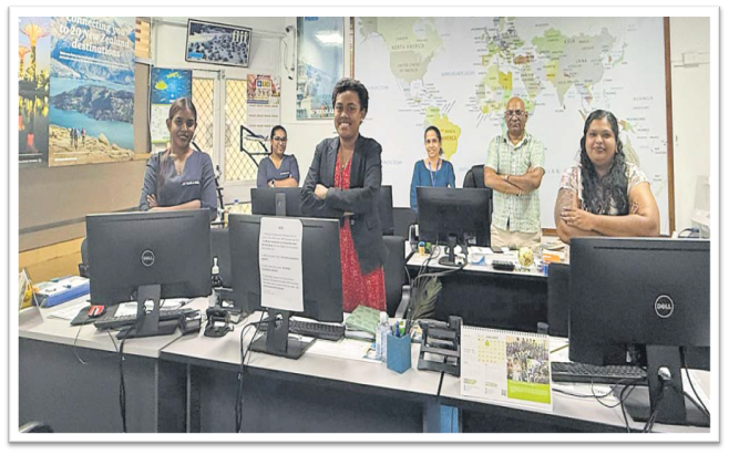 Jet Travel owner Satnam Singh, second from right, with his staff at their office in Mark Street Suva. Inset: Jet Travel’s new Nadi branch to open today. Picture: JOSEFA SIGAVOLAVOLA