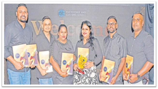 FMF Group staff members ... from left: Ashaal Kumar, Preayant Kumar, Priya Prasad, Swastika Prasad, Shonal Kavitesh Deo and Elias Mohammed with their gold card membership during the Gold Card & Authorised Economic Operator (AEO) Membership Renewal ceremony at the Fiji Revenue & Customs Service conference room in Nasese, Suva on Wednesday. Picture: JONACANI LALAKOBAU