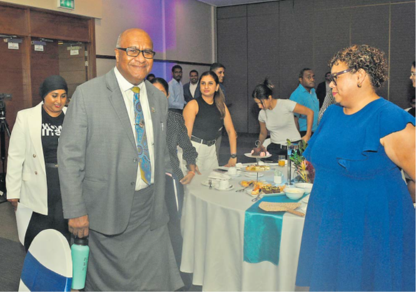 Deputy Prime Minister and Minister for Trade, Cooperatives, MSMEs and Communications Manoa Kamikamica arrives for the Women in Tech Fiji launch at the Grand Pacific Hotel in Suva yesterday, escorted by Women in Tech Fiji Country Director Sagufta Janif. Picture: JONACANI LALAKOBAU