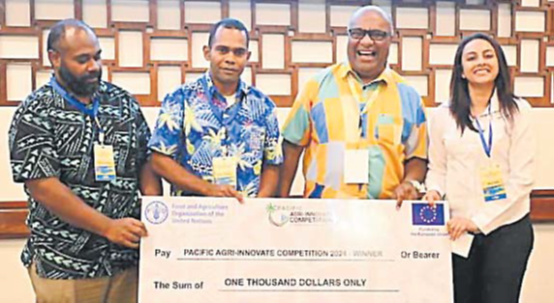 Asaeli Uluimoala, second from left, receives the Pacific-Agri Innovative Competition winning cheque from the Deputy Prime Minister and Minister for Trade, Manoa Kamikamica during the 2024 Pacific Island Development States Solution Forum held in Sheraton Resort, Denarau last year. Picture: SUPPLIED