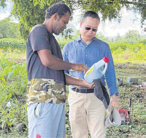 New head of the United Nation Food and Agriculture Organization(UNFAO) Sub-Regional Office for Pacific Island countries
Guangzhou Qu, right, visited the Uluilomaloma farm as part of
the FAO model farm visit through the Pacific Agri-Innovative
Competition. Picture: LENAITASI CAVUILATI