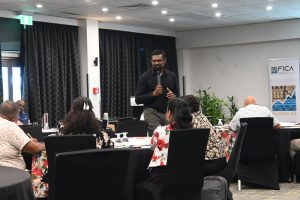 Pri-Plan Limited director Mitesh Mudaliar, in black, makes apoint at the FICA sustainability workshop in Suva. Picture: FICA