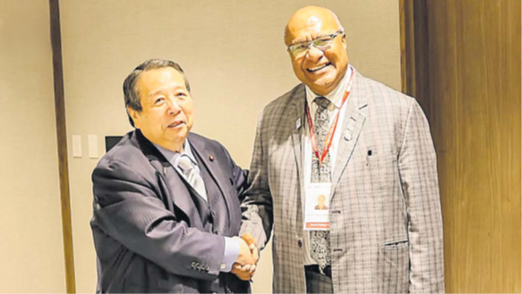 Digital deal ... Japan’s Minister of Internal Affairs and Communications Seiichiro Murakami, left, with Fiji’s Deputy Prime Minister and Minister for Trade and Communications Manoa Kamikamica during the Asia-Pacific Telecomunity (APT) Ministerial meeting held in Tokyo, Japan last week. Picture: MINISTRY OF TRADE