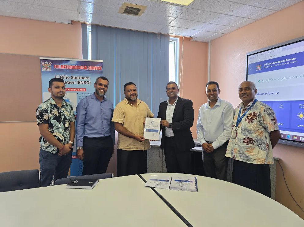 FMS director Misaeli Funaki, 3rd from left, and Datec Fiji CEO Vinit Nand, 4th from left, with staff of FMS and Datec at the official launch of the new digital system. Picture: SUPPLIED