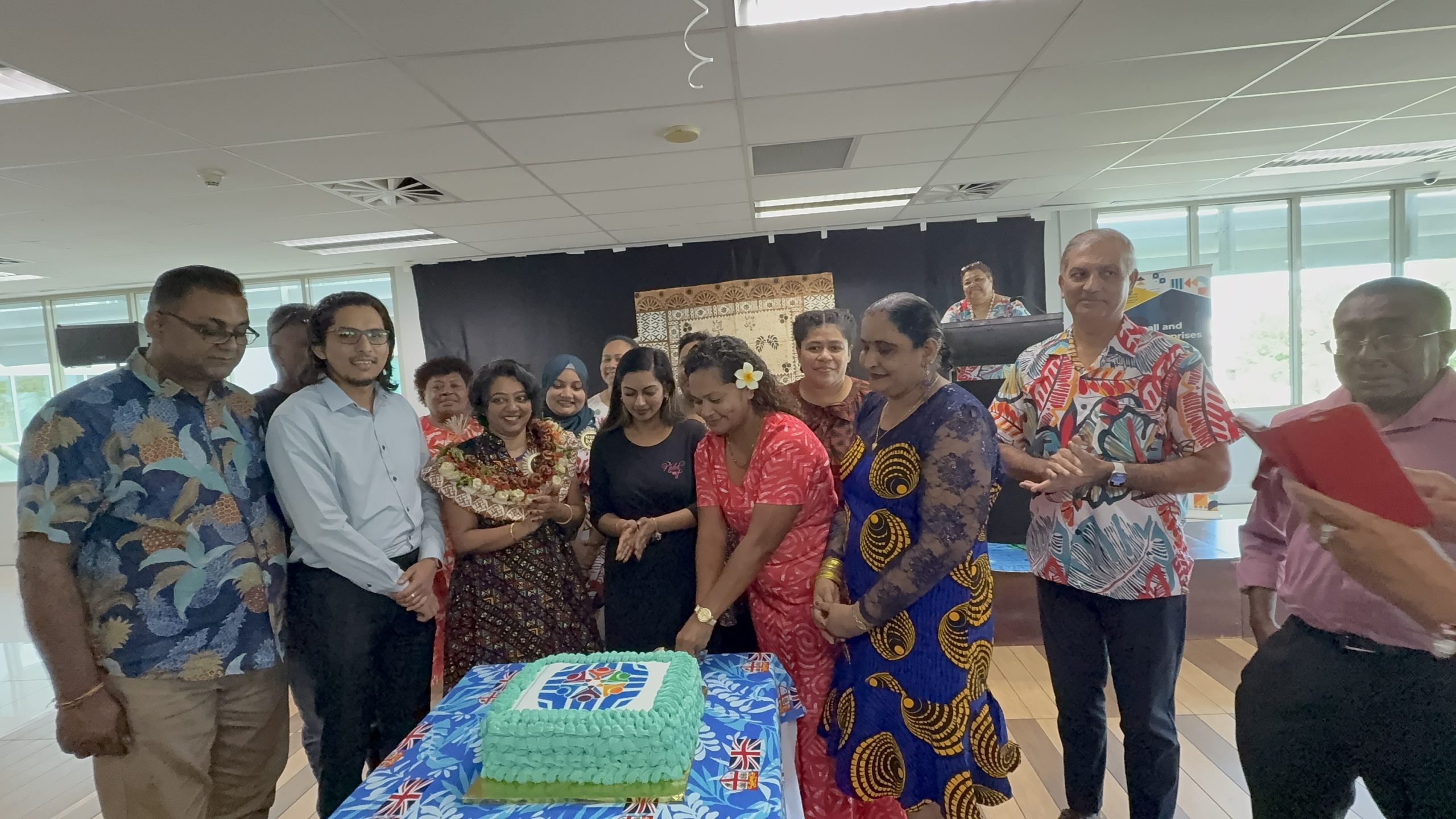 Three-star recipients pictured with Minister for Women, Children and Social Protection Sashi Kiran (with garland) and FRCS CEO Udit Singh (2ndright) in a cake cutting ceremony to mark National MSME Day at FRCS HQ in Suva yesterday. Picture: JOSEFA SIGAVOLAVOLA.