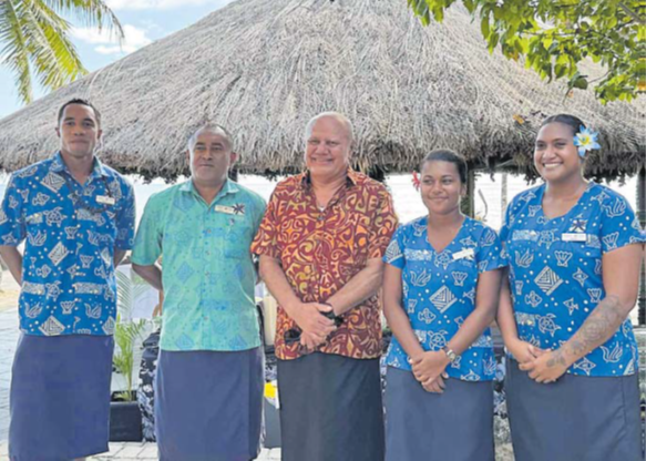DPM and Minister for Tourism Viliame Gavoka with staff of Castaway Island Fiji Resort. Picture: ELENA VUCUKULA