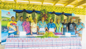 Rosie Travel Group general manager, Eroni Puamau(fifth from left) with the managing director of
Muanivatu Trails Epeli Asaro (beside Mr Puamau) and
community representatives during the signing ceremony
at Vuadomo Village in Savusavu. Picture: SUPPLIED