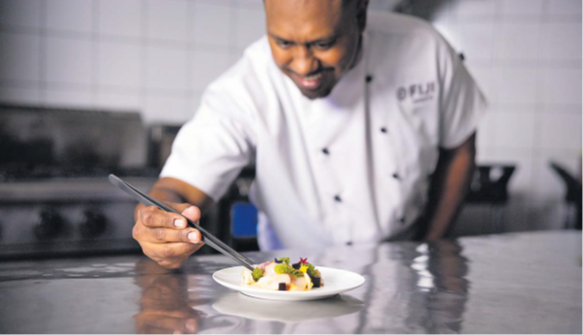 A chef prepares the Hamachi Crudo with Octopus and Ponzu and Fijian nama.  Inset: Hamachi Crudo with Octopus and Ponzu and Fijian nama for Dine On Demand. Pictures: SUPPLIED