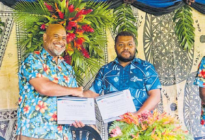 Rosie Travel Group general manager Eroni Puamau(left) shakes the hand of the managing director
of Muanivatu Trails, Epeli Asaro after the signing
ceremony at Vuadomo Village in Savusavu. Picture:
SUPPLIED