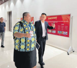 Suva City Council IT expert Albert Wong in a conversationwith a representative from the Inspur group during the Fiji
delegation’s tour to the Inspur head office in Shandong, China.
Picture: JOSEFA SIGAVOLAVOLA