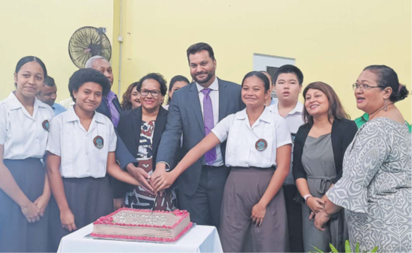 Insurance Association of Fiji chairman Avi Raju (with purple tie) and members of IAF and students of Yat Sen Secondary School at the launch of the Inaugural IAF National Logo Competition on Tuesday. Picture: MERI RADINIBARAVI