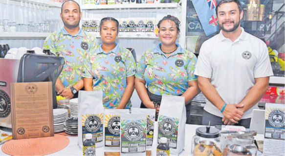 South Pacific Coffee Company operations manager Maikeli Dennis (right) with some of his staff at their outlet along the Nadi Back Rd. Picture: REINAL CHAND
